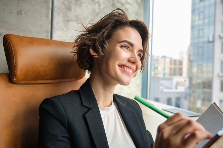 Portrait of woman working in her office