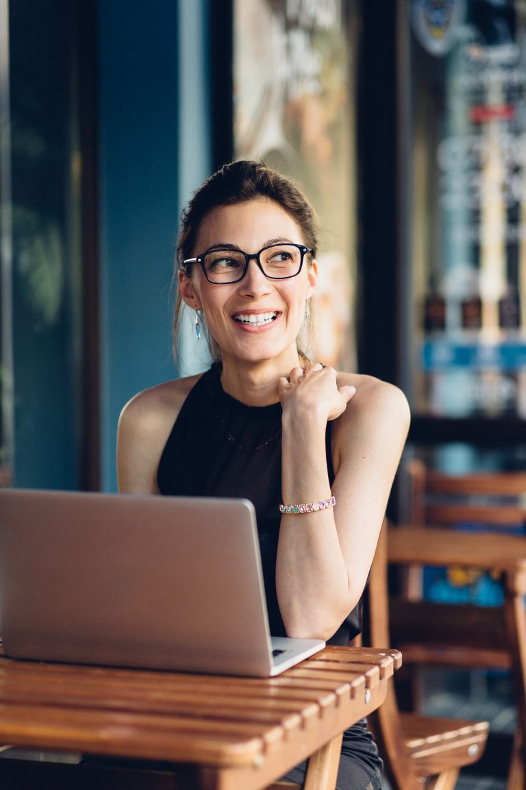 Attractive business woman working at his laptop
