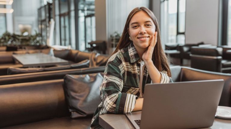 pretty-young-woman-enjoying-coffee-break